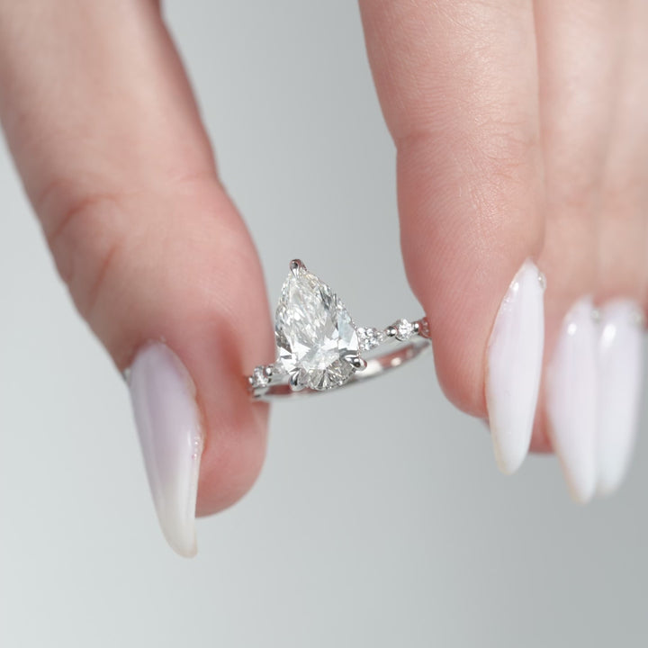 The Lyra Pear Lab Diamond Moissanite Engagement Ring *Shown with 2 ct #material_white