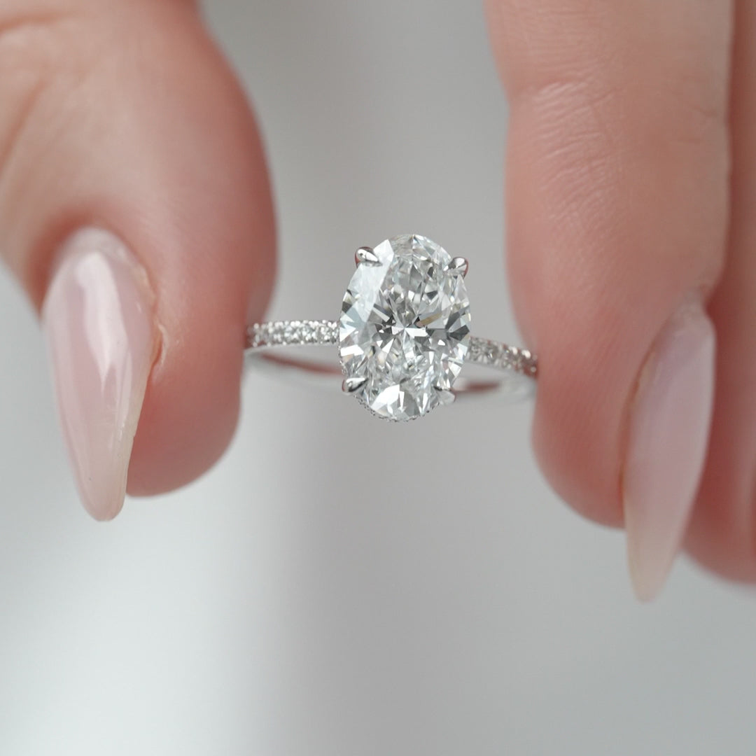 The Pave April Oval Lab Diamond Moissanite Engagement Ring