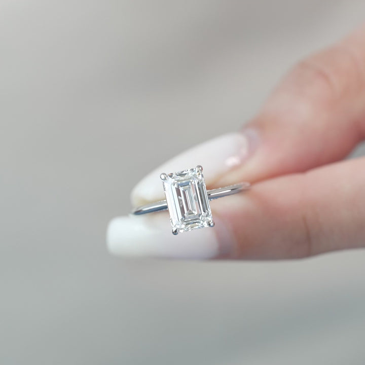 The Clara Emerald Lab Diamond Moissanite Engagement Ring *Shown with 2.5 ct #material_white