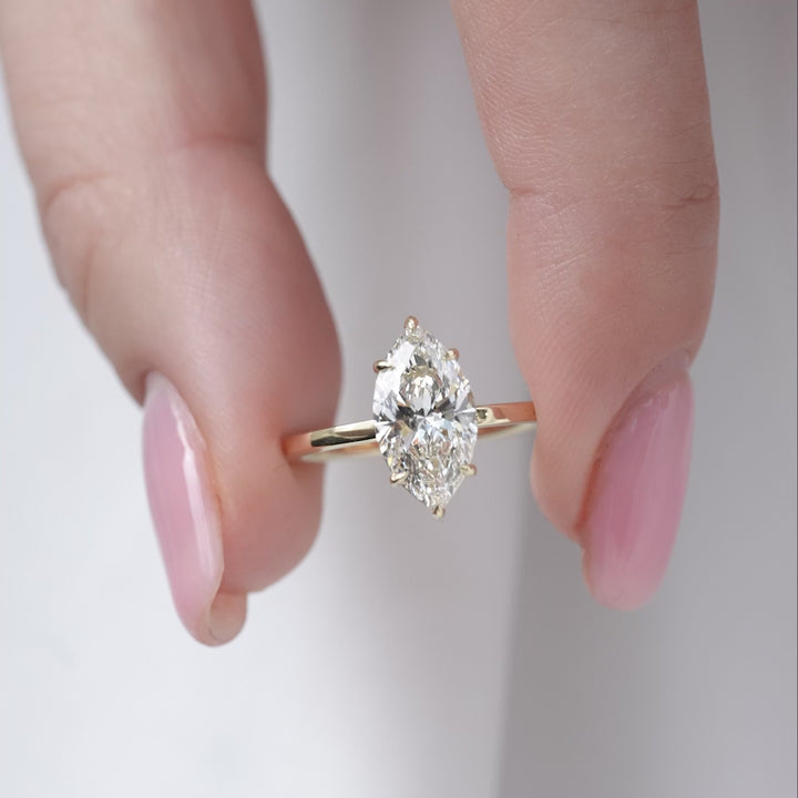 The Estella Marquise Lab Diamond Moissanite Engagement Ring *Shown with 2 ct #material_gold