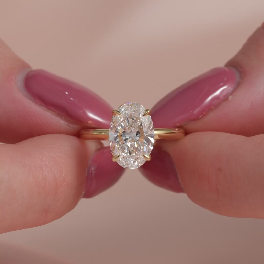 The April Oval Lab Diamond Moissanite Engagement Ring