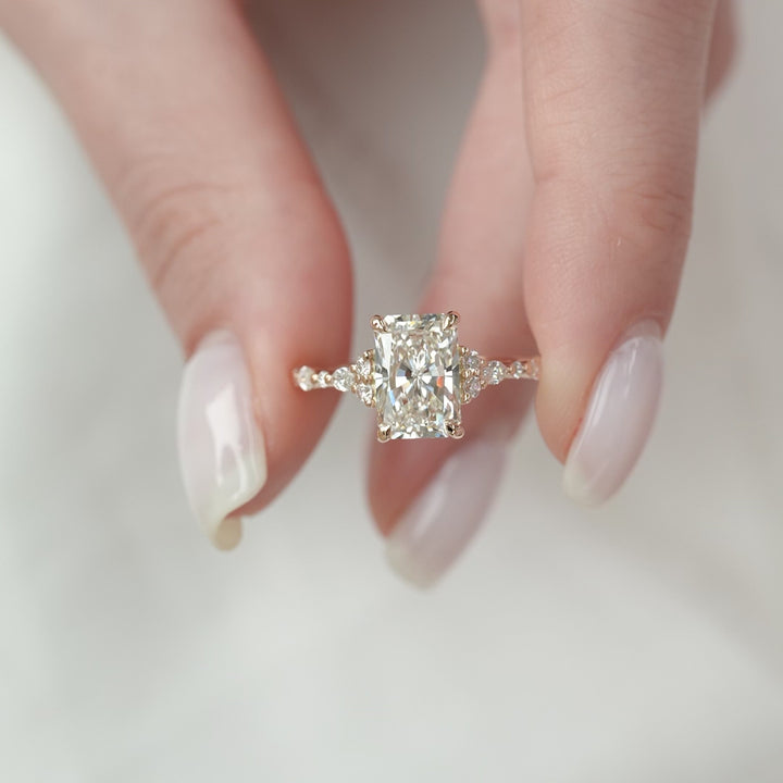 The Kaiden Radiant Lab Diamond Moissanite Engagement Ring *Shown with 3 ct *Hidden Halo
/ Pave Prongs *Pave Bridge / 75% Around #material_rose