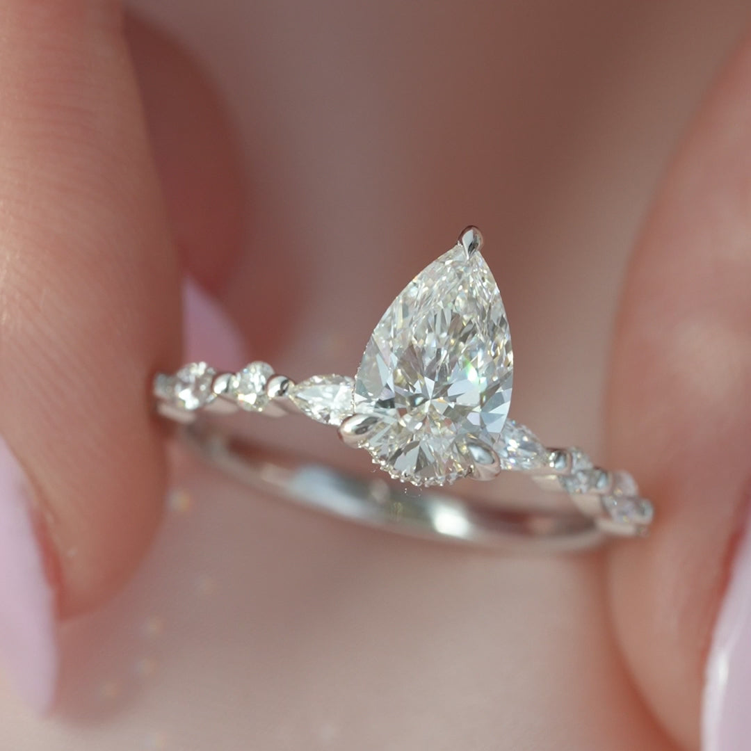 The Lyra Pear Lab Diamond Moissanite Engagement Ring