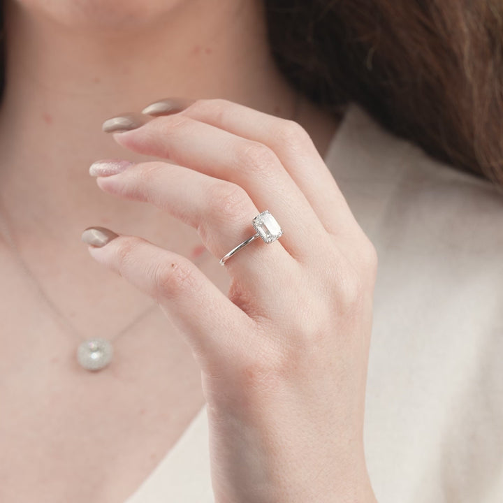 The April Emerald Lab Diamond Moissanite Engagement Ring *Shown with 3 ct #material_white