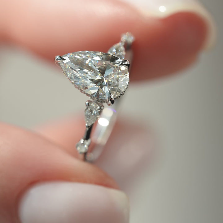 The Niko Pear Lab Diamond Moissanite Engagement Ring *Shown with 1.5 ct #material_white