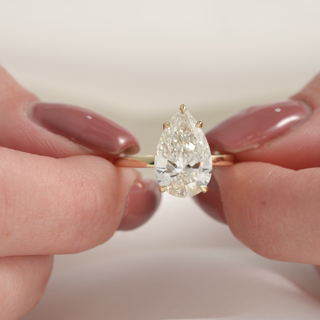 The Estella Pear Lab Diamond Moissanite Engagement Ring
