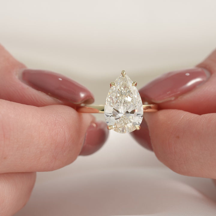 The Estella Pear Lab Diamond Moissanite Engagement Ring *Shown with 4 ct #material_gold