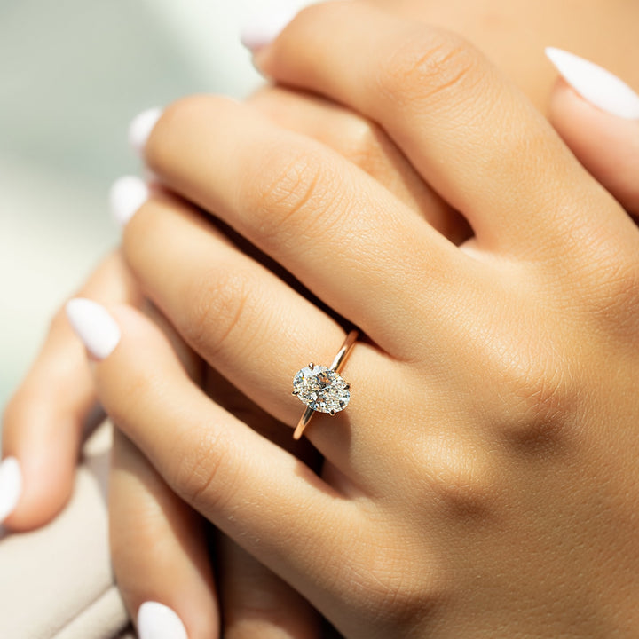 The April Oval Lab Diamond Moissanite Engagement Ring *Shown with 1.5 ct #material_rose