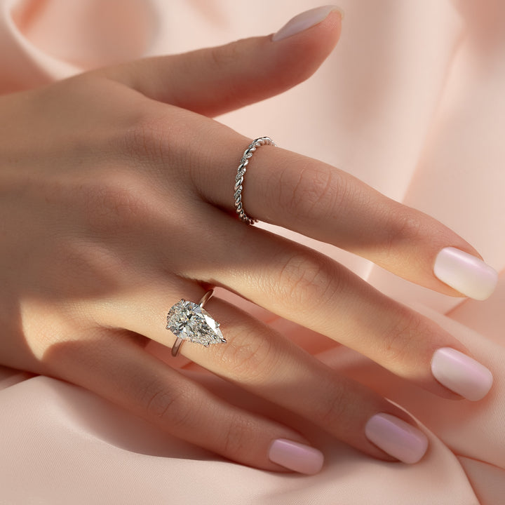 The April Pear Lab Diamond Moissanite Engagement Ring *Shown with 4 ct #material_white