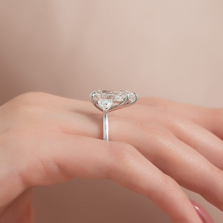 The Hearts Leona Pear Lab Diamond Moissanite Engagement Ring *Shown with 5.5 ct #material_white