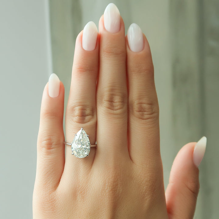 The Lacole Pear Lab Diamond Moissanite Engagement Ring *Shown with 5 ct #material_white