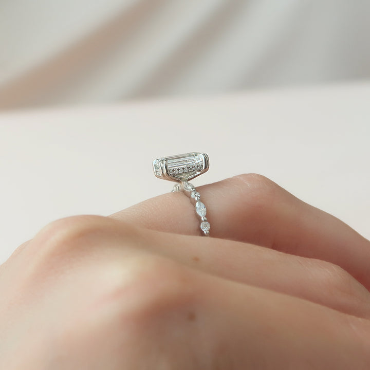 The Lyra Emerald Lab Diamond Moissanite Engagement Ring *Shown with 3 ct #material_white