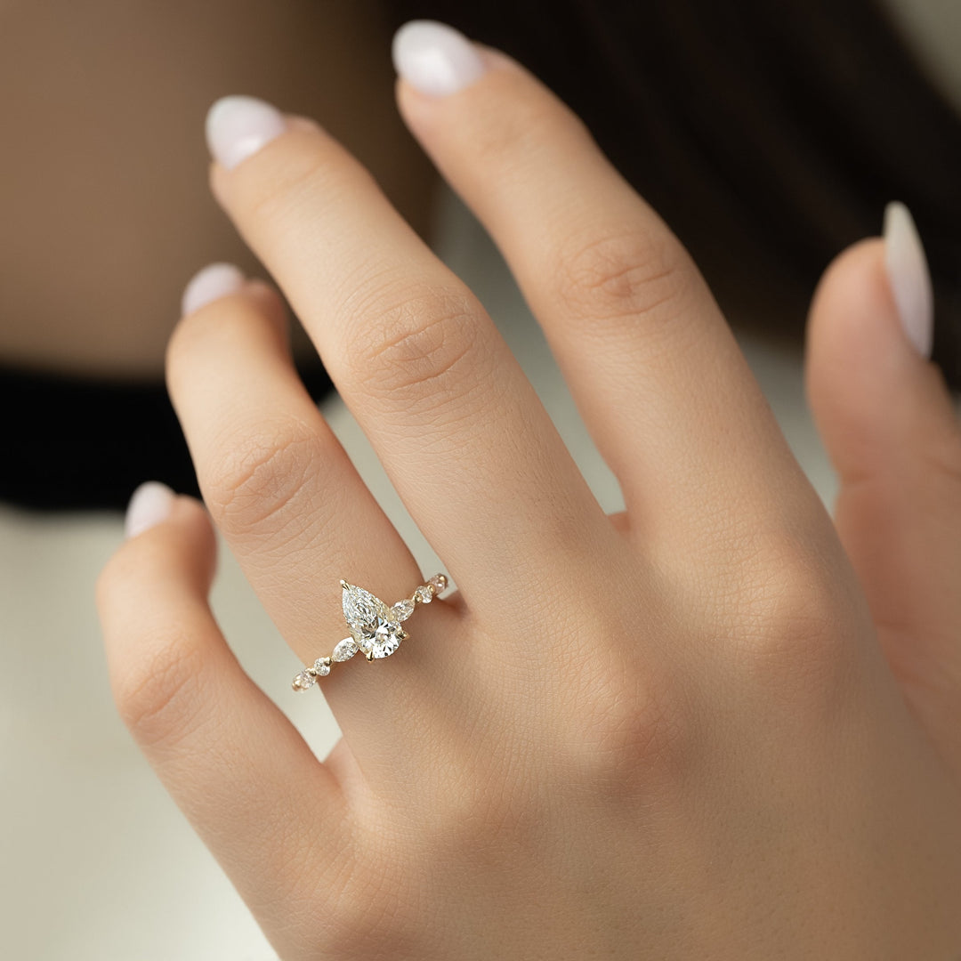 The Lyra Pear Lab Diamond Moissanite Engagement Ring