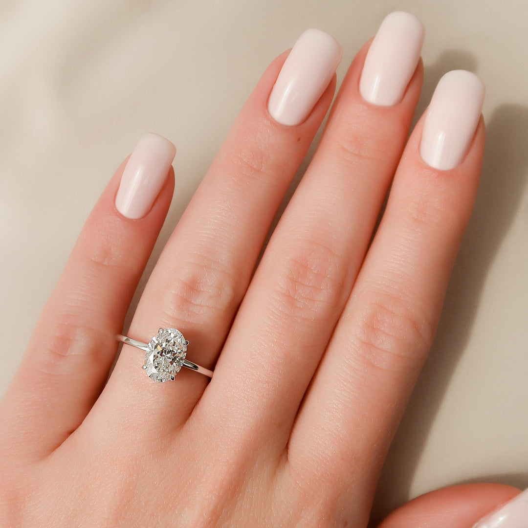 The Navy Oval Lab Diamond Moissanite Engagement Ring