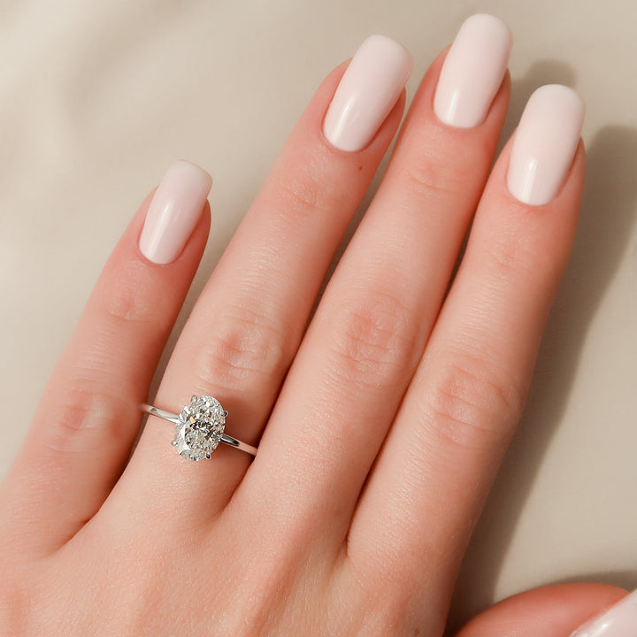 The Navy Oval Lab Diamond Moissanite Engagement Ring *Shown with 2 ct #material_white