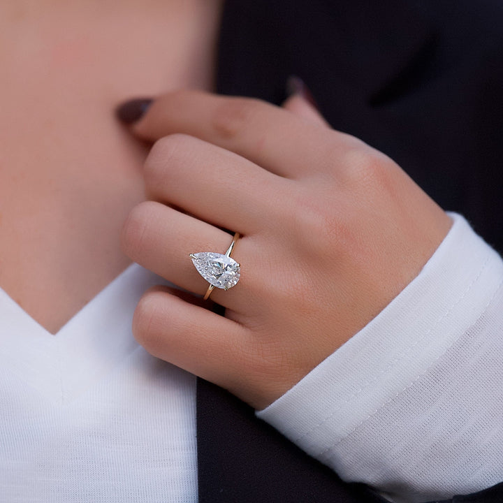 The Navy Pear Lab Diamond Moissanite Engagement Ring *Shown with 3 ct #material_gold
