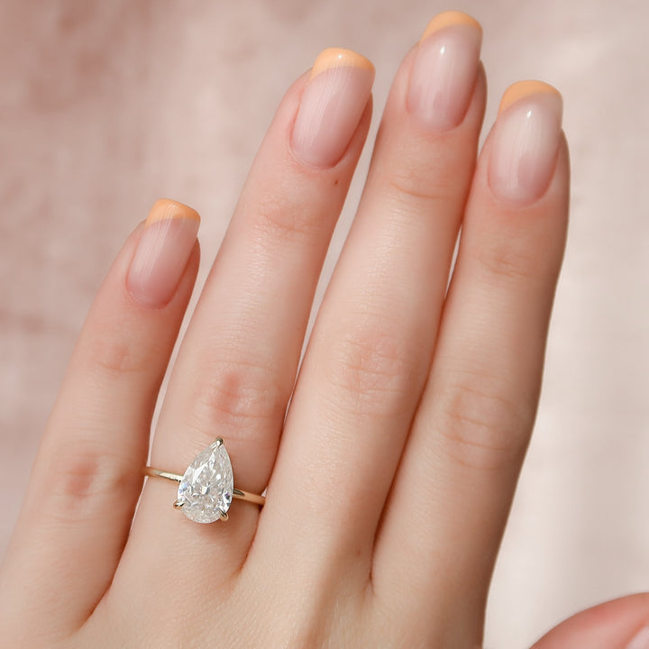 The Navy Pear Lab Diamond Moissanite Engagement Ring *Shown with 2.5 ct #material_gold