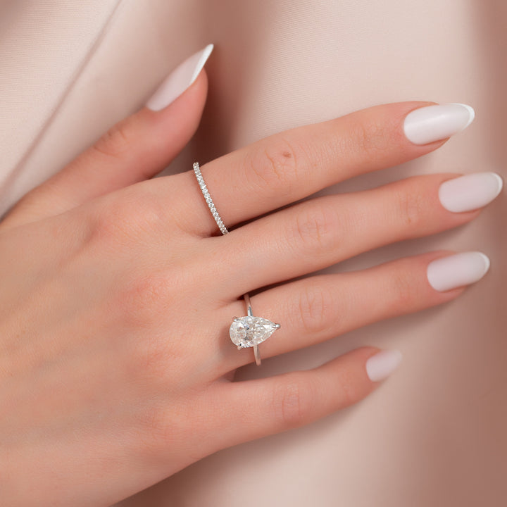 The Navy Pear Lab Diamond Moissanite Engagement Ring *Shown with 2.5 ct #material_white