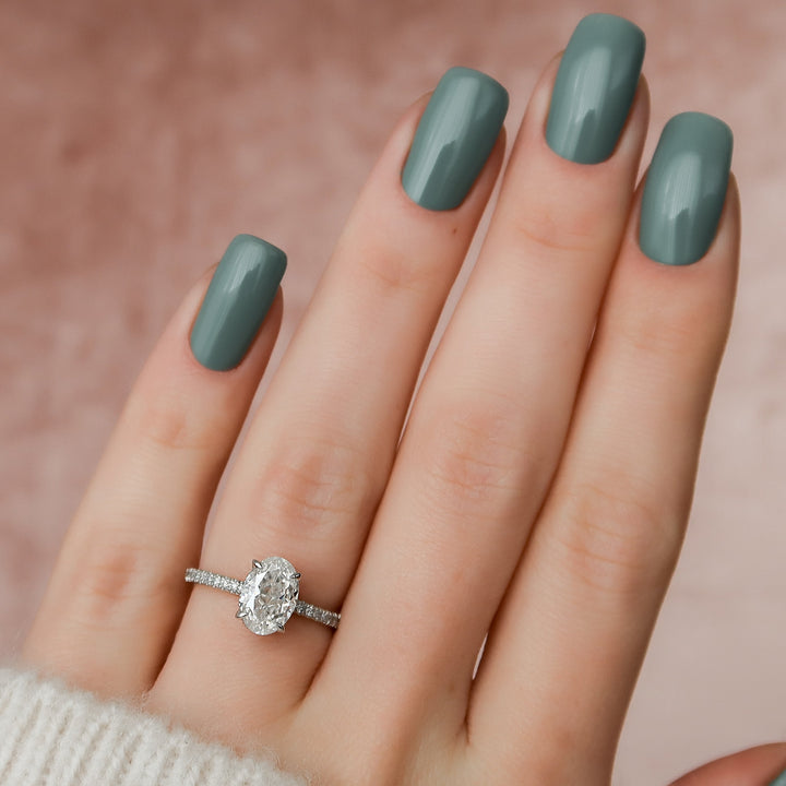 The Pave April Oval Lab Diamond Moissanite Engagement Ring *Shown with 1.5 ct #material_white