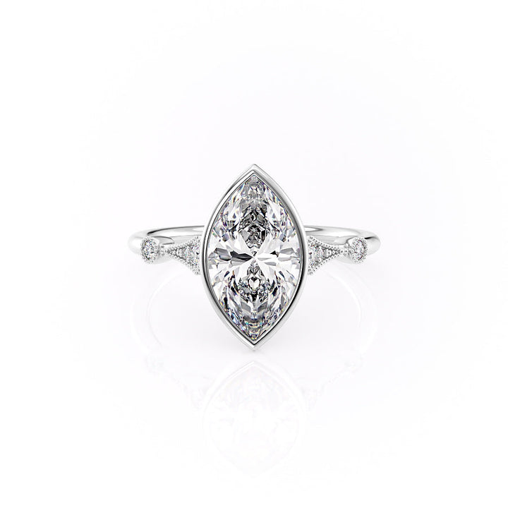 Diamond ring with a marquise-shaped center stone on a white background#material_white