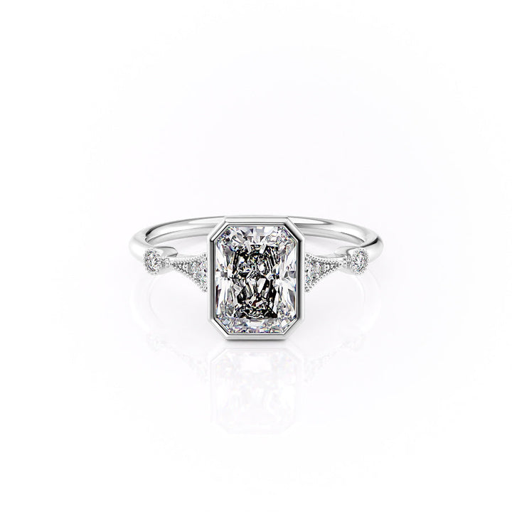 Diamond ring with a rectangular center stone on a white background#material_white