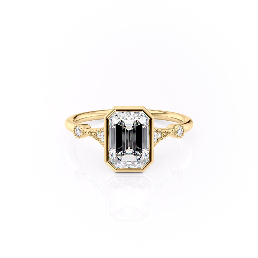 Gold ring with a central emerald-cut gemstone and diamond accents on a white background#material_gold