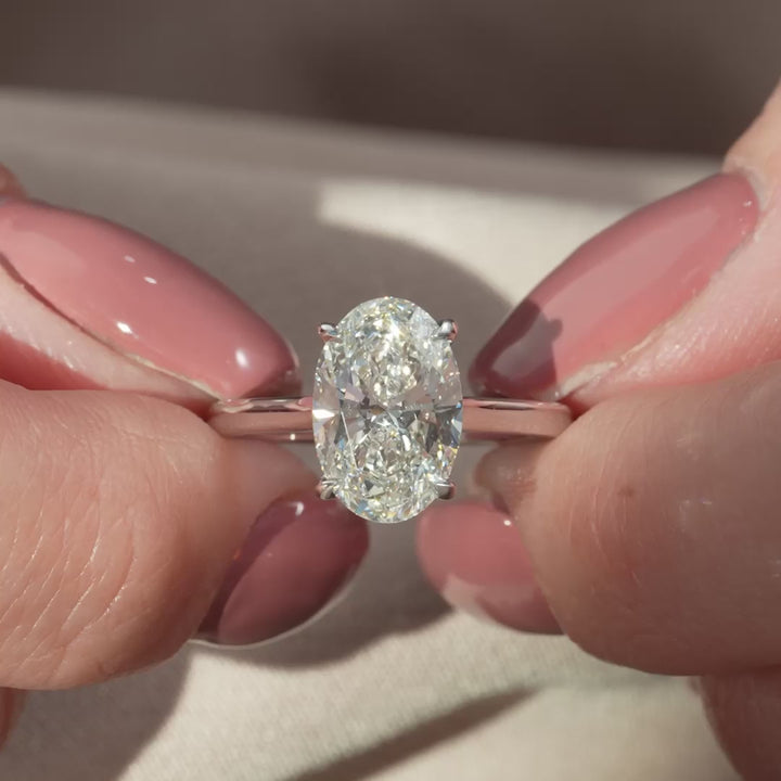 The Natasha Oval Lab Diamond Moissanite Engagement Ring *Shown with 2.5 ct #material_white