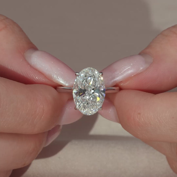 The Natasha Oval Lab Diamond Moissanite Engagement Ring *Shown with 5.5 ct #material_white