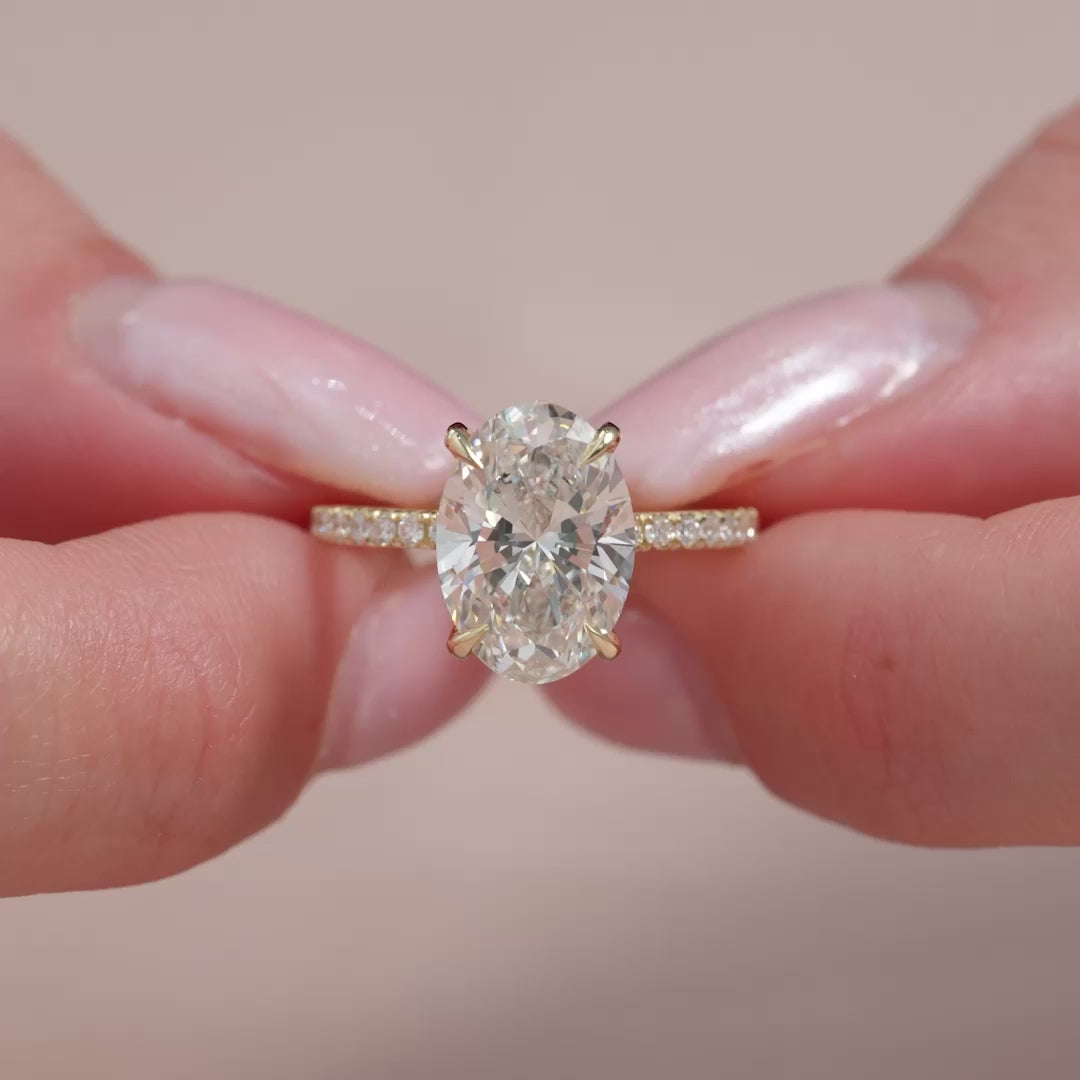 The Pave Navy Oval Lab Diamond Moissanite Engagement Ring