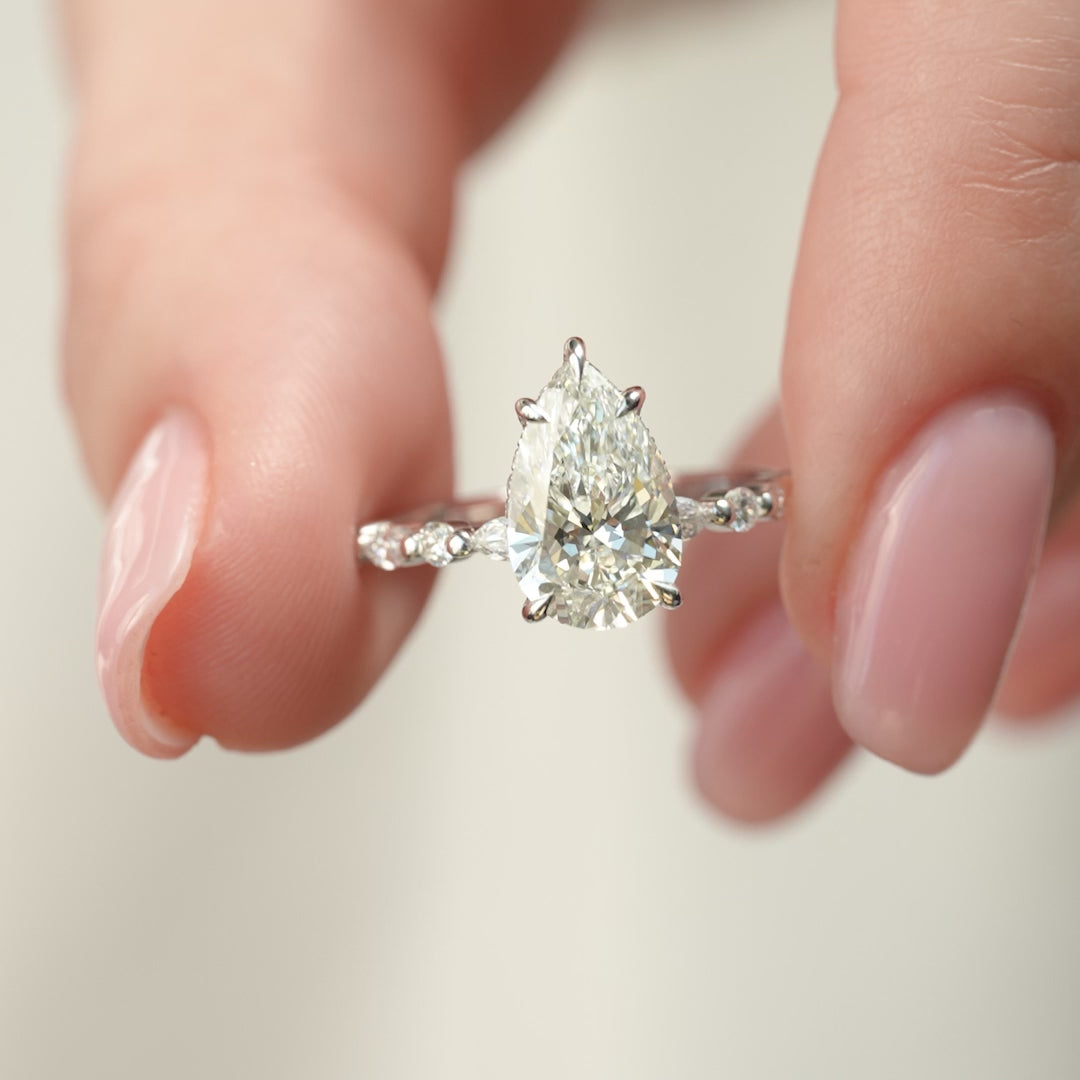 The Lyra Pear Lab Diamond Moissanite Engagement Ring