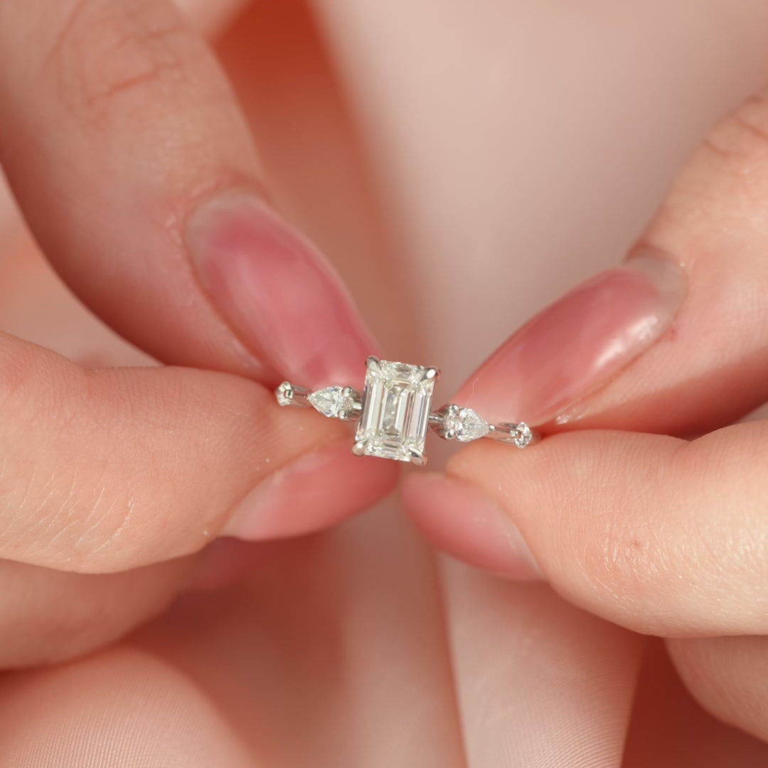 The Niko Emerald Lab Diamond Moissanite Engagement Ring