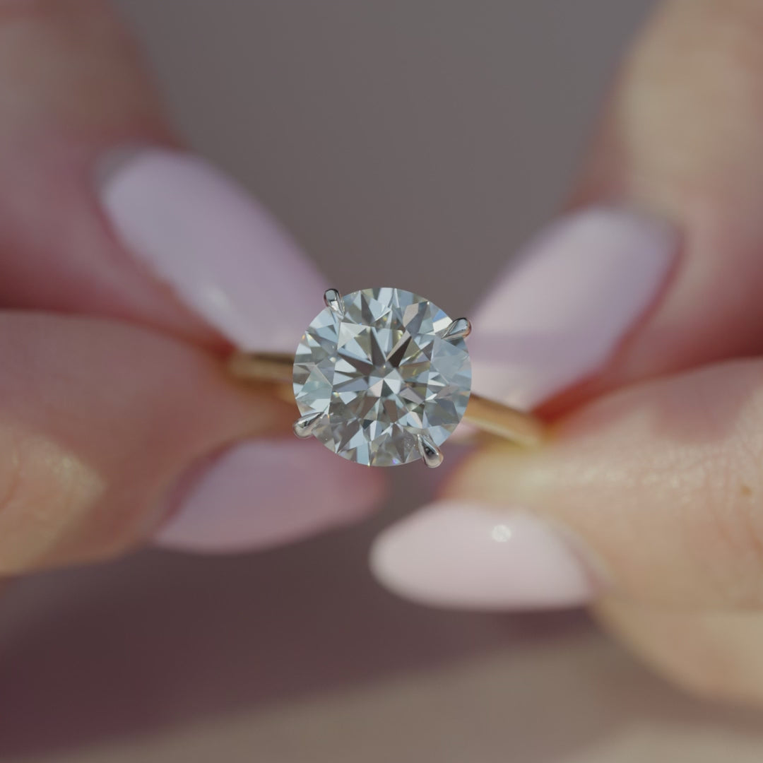 The Natasha Round Lab Diamond Moissanite Engagement Ring