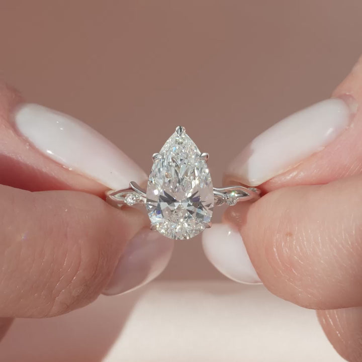The Coco Pear Lab Diamond Moissanite Engagement Ring *Shown with 3 ct #material_white