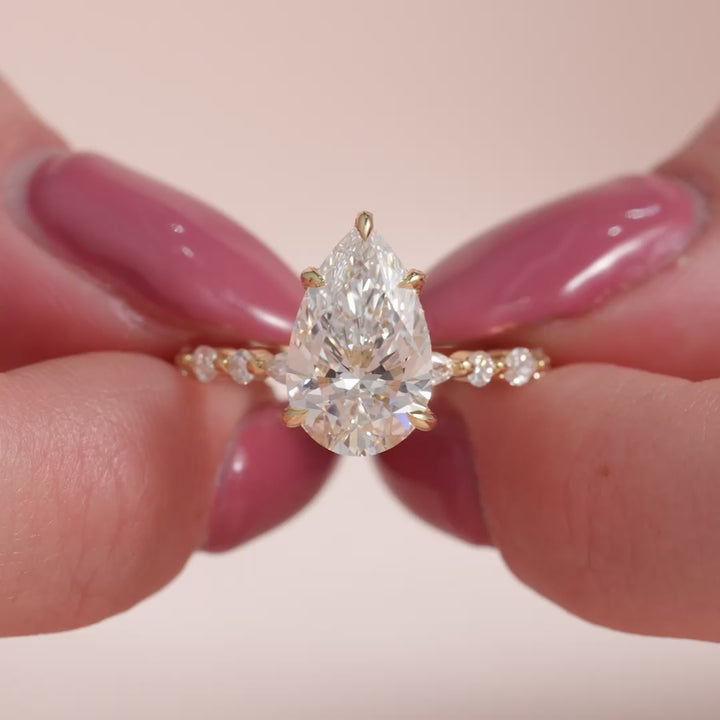 The Lyra Pear Lab Diamond Moissanite Engagement Ring *Shown with 3 ct #material_gold