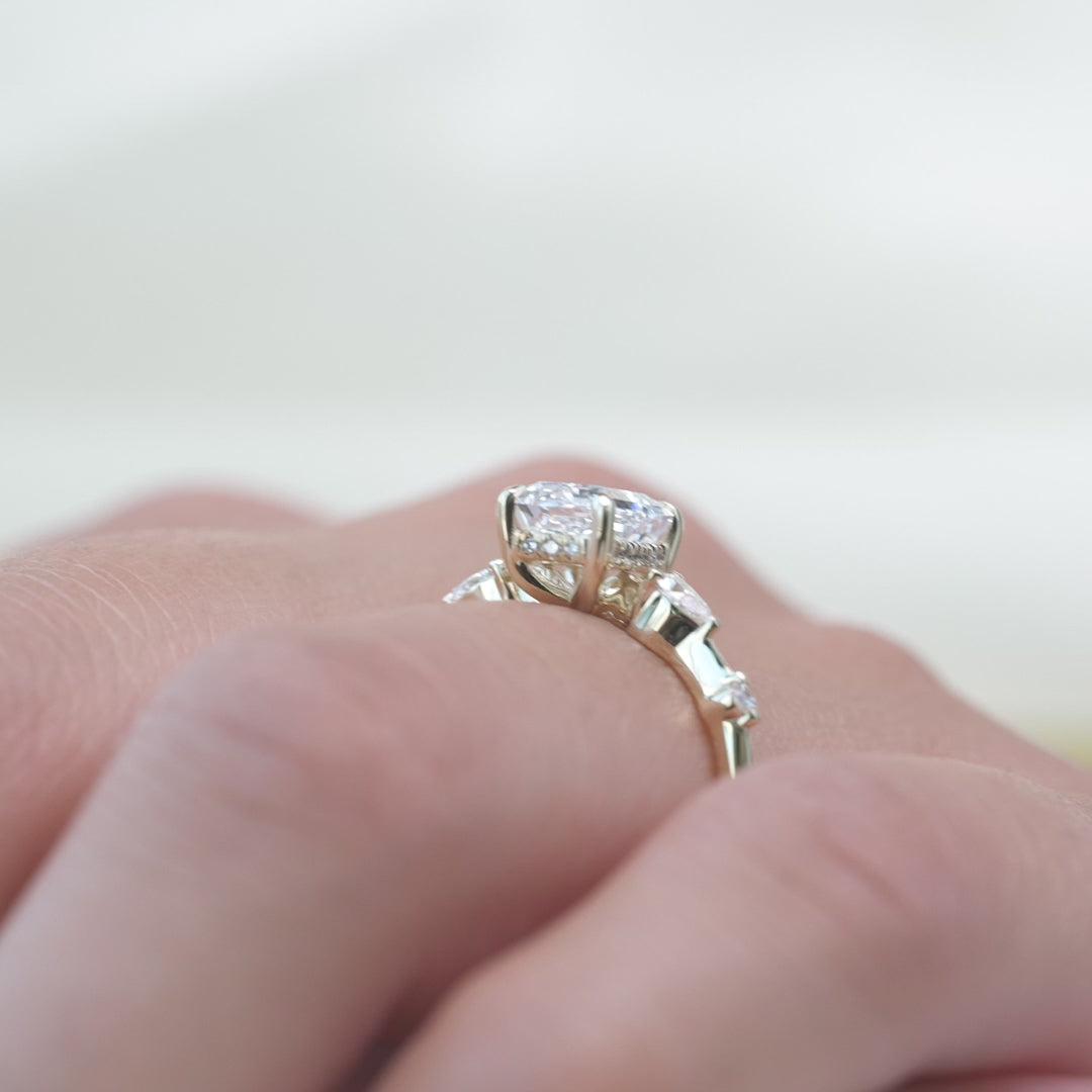 The Niko Emerald Lab Diamond Moissanite Engagement Ring