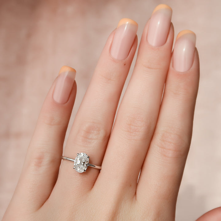 The April Oval Lab Diamond Moissanite Engagement Ring *Shown with 1.5 ct #material_white