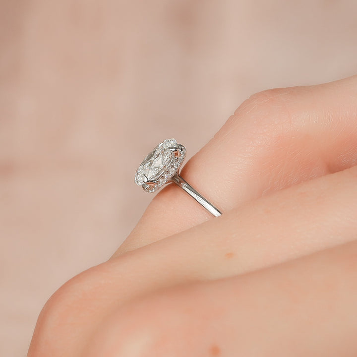 The April Oval Lab Diamond Moissanite Engagement Ring *Shown with 1.5 ct #material_white
