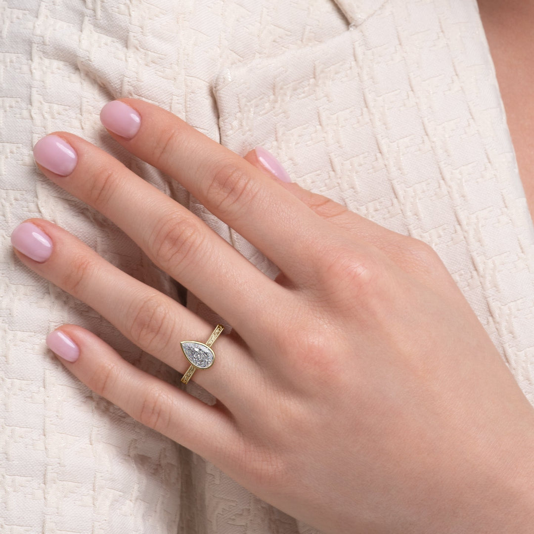 The Bezel Skye Set With A Pear Lab Diamond#material_gold