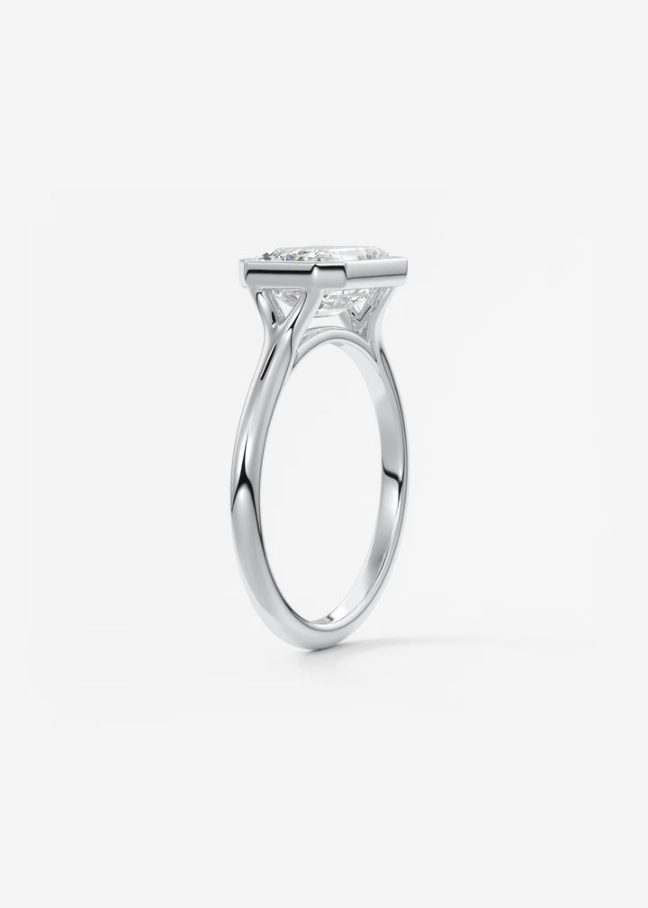 The Blanche Horizon Modern East West Emerald Cut Bezel Set Engagement Ring#material_white