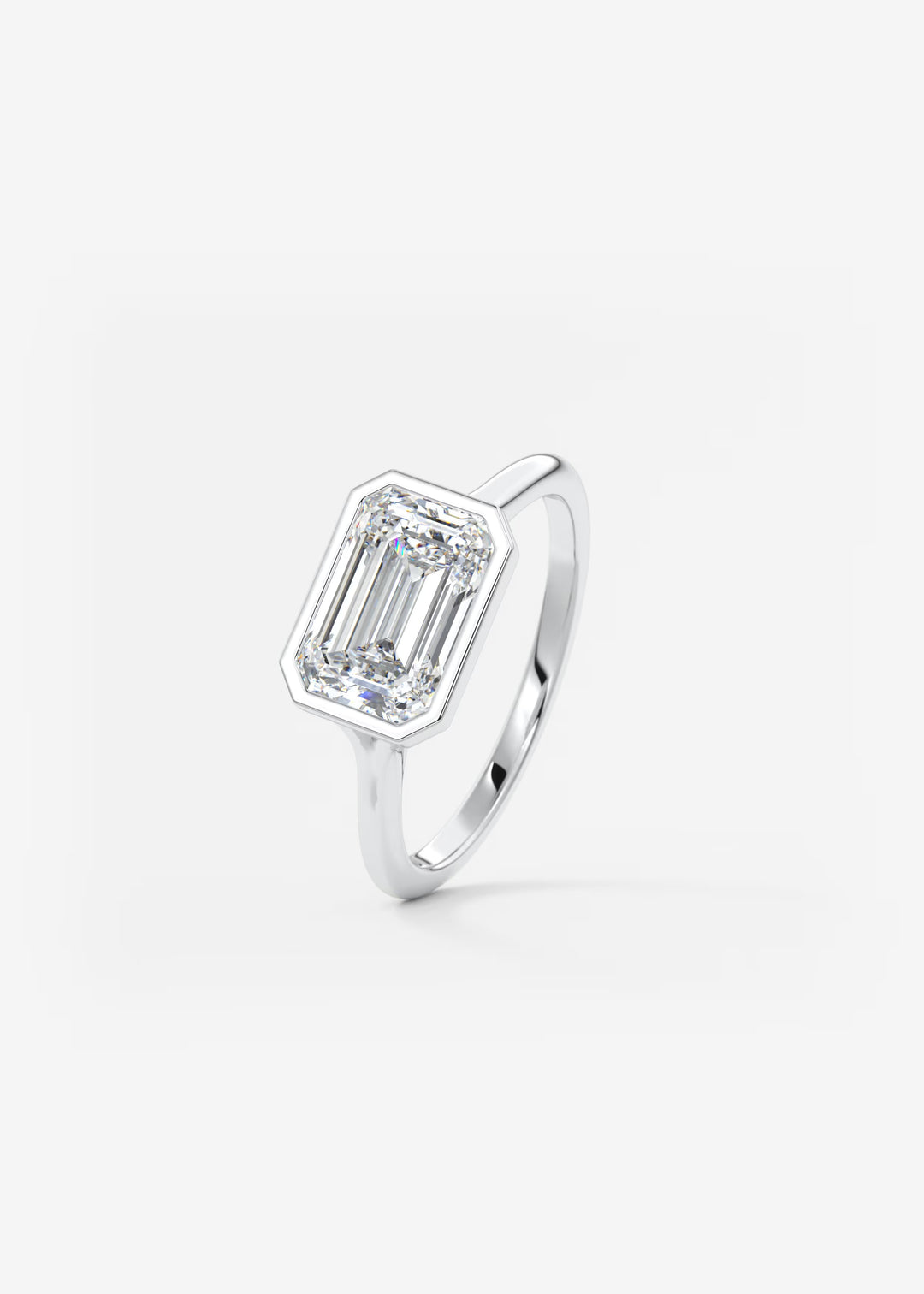 The Blanche Horizon Modern East West Emerald Cut Bezel Set Engagement Ring#material_white