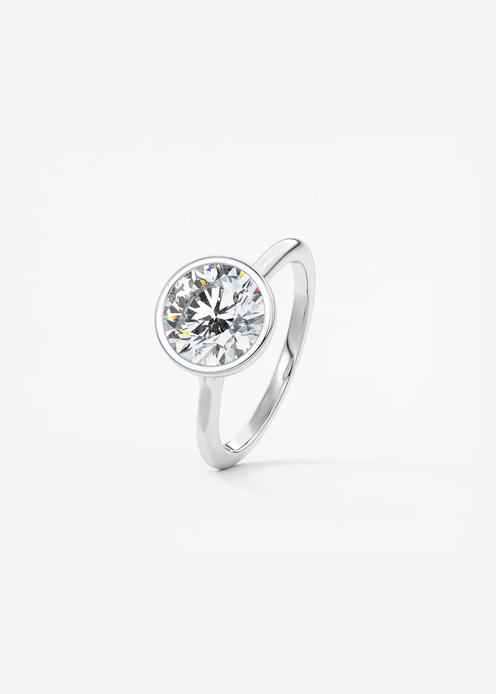 The Blanche Modern Round Cut Bezel Set Engagement Ring#material_white