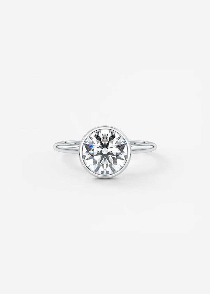 The Blanche Modern Round Cut Bezel Set Engagement Ring#material_white