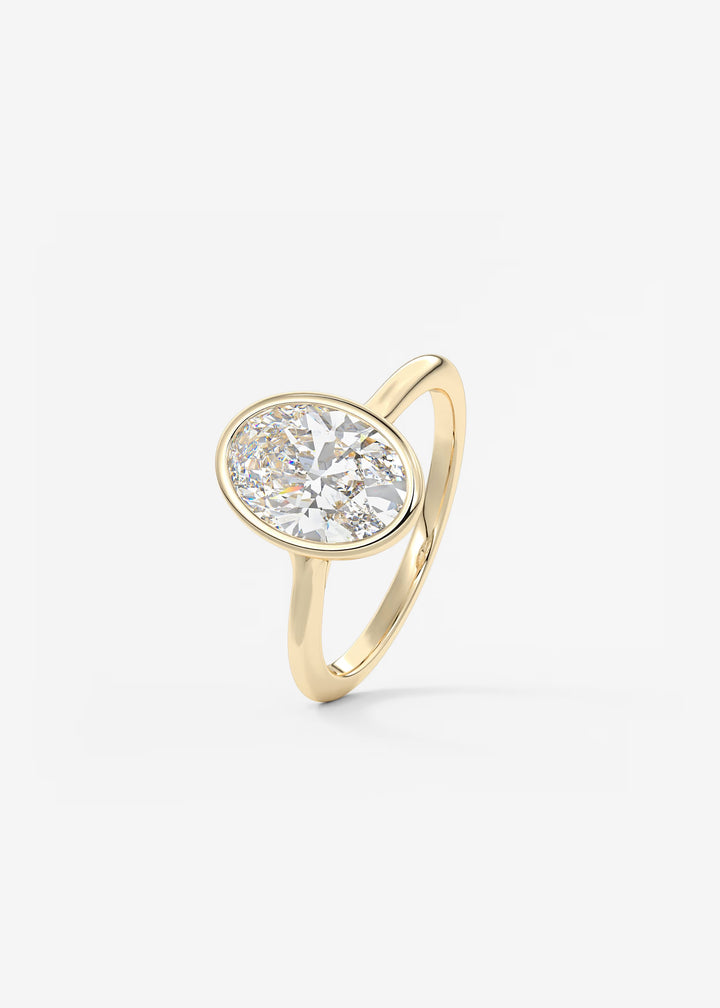 The Blanche Modern Oval Cut Bezel Set Engagement Ring#material_gold