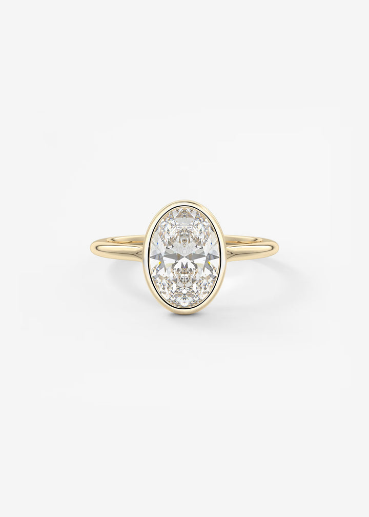The Blanche Modern Oval Cut Bezel Set Engagement Ring#material_gold