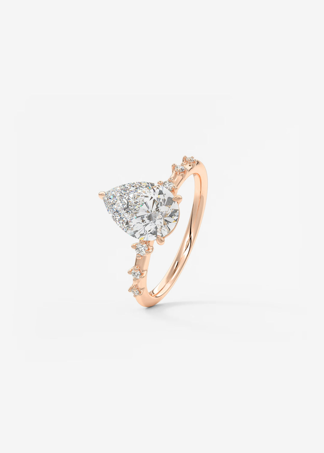 The Celeste Pear Engagement Ring with Delicate Diamond Accents#material_rose