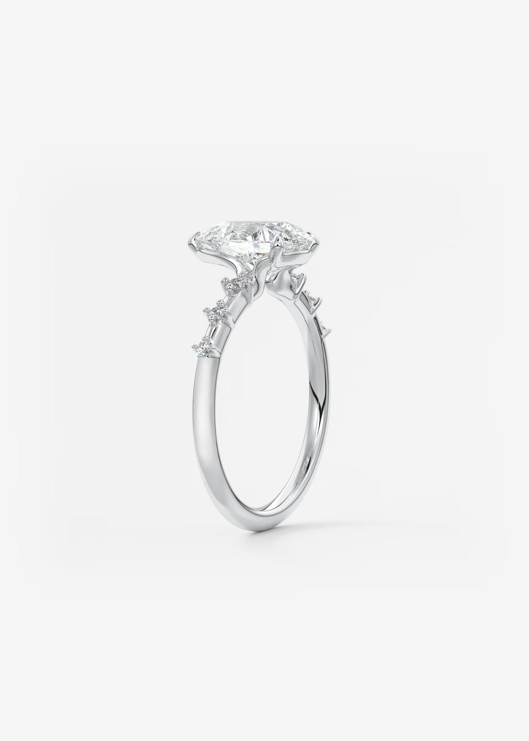 The Celeste Pear Engagement Ring with Delicate Diamond Accents#material_white