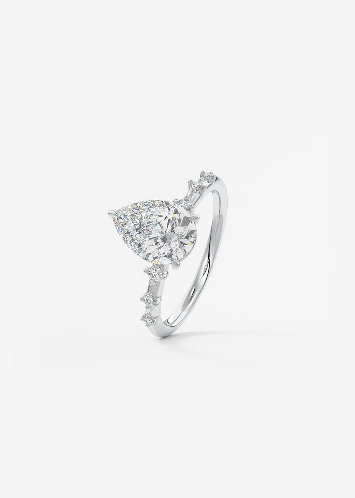 The Celeste Pear Engagement Ring with Delicate Diamond Accents#material_white