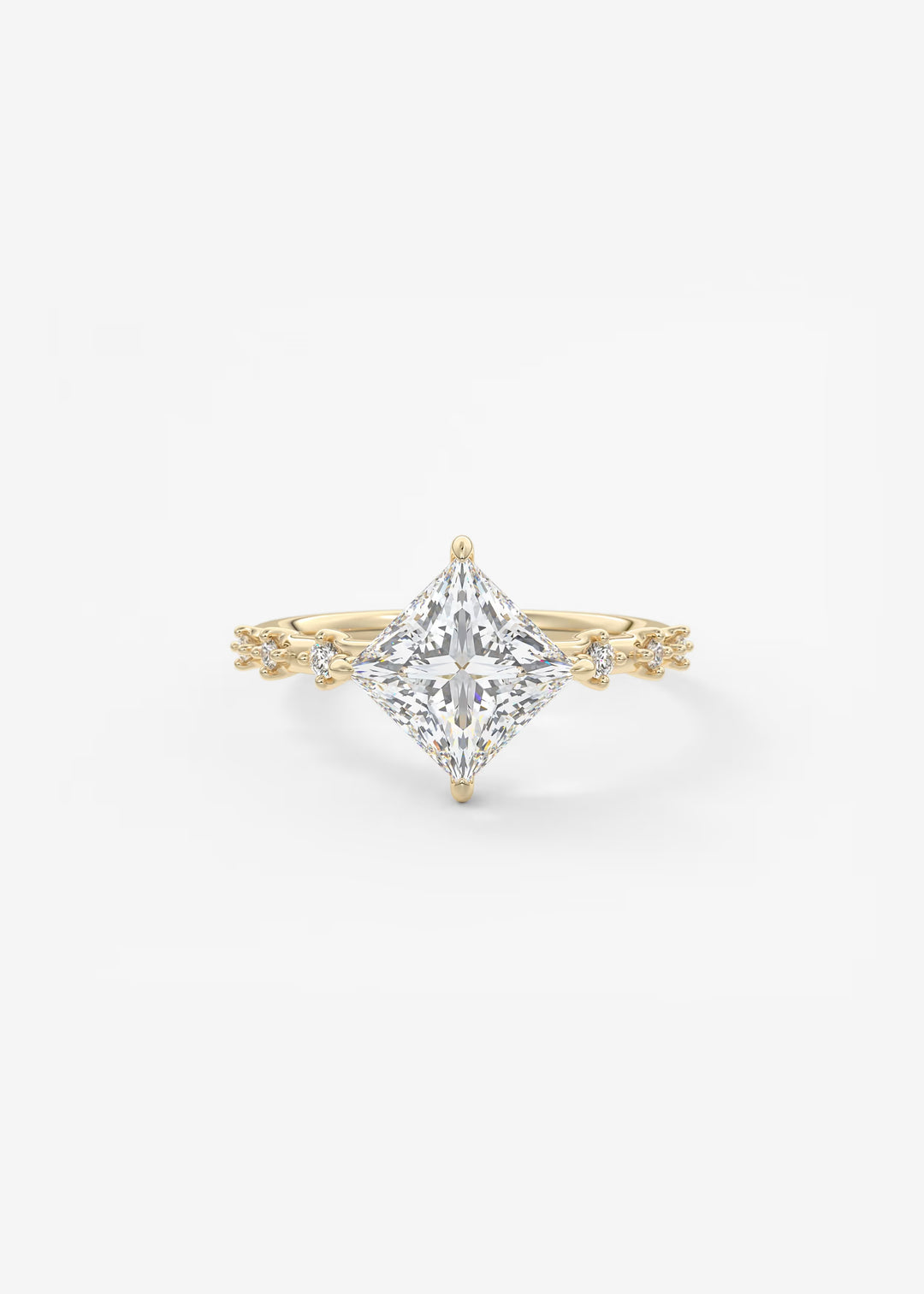 A yellow gold ring featuring a large princess-cut clear center stone with delicate gold side accents, set against a clean white background.#material_gold