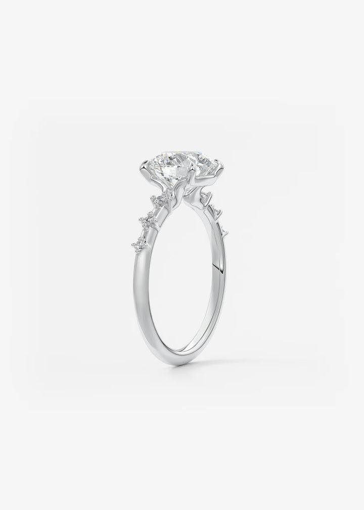 The Celeste Round Engagement Ring with Delicate Diamond Accents#material_white