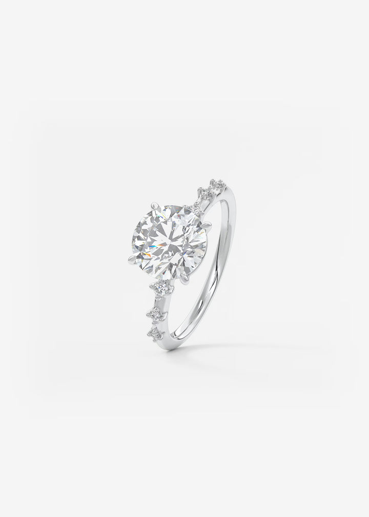 The Celeste Round Engagement Ring with Delicate Diamond Accents#material_white